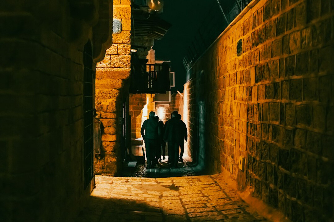 shadowy detective in alley